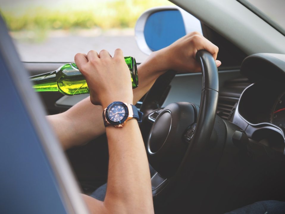 driver drinking alcohol while driving